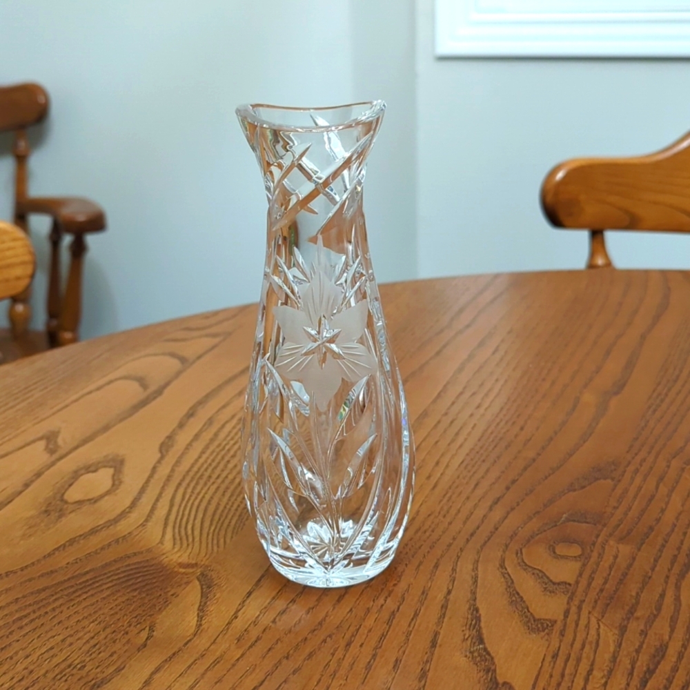 - - Crystal vase. 7.5 inches high.   Heavy weight for the size. Etched flo…